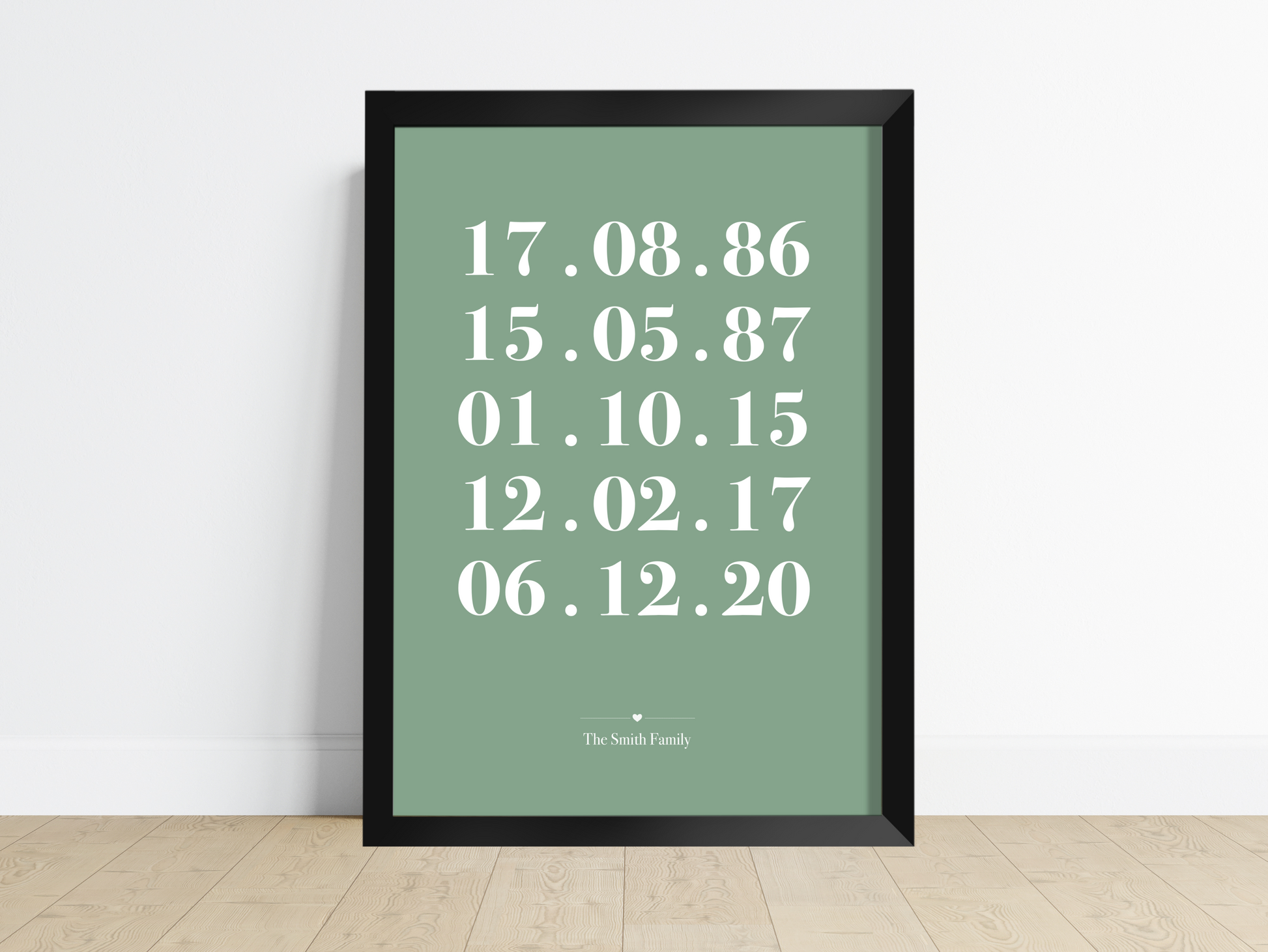 A beautifully framed Personalised Family Dates Print displayed on a wall. The print showcases a clean and minimalist design with customisable dates representing significant milestones. It serves as a heartfelt reminder of cherished memories and makes an ideal gift for weddings, housewarmings, or as a stylish addition to any family home.